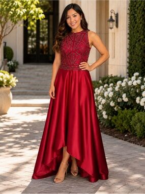 Elegant Red Sleeveless Gown with Beaded Bodice